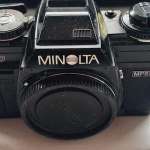Minolta X-700 35mm Film Camera - 50mm and 135mm Lenses Included