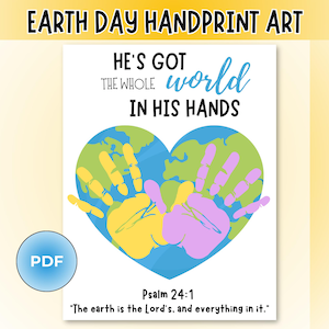 May include: Earth Day handprint art print featuring a heart-shaped world with handprints in yellow, green, and purple. The text reads "He's got the whole world in his hands" and "Psalm 24:1". A PDF icon is in the lower left corner.