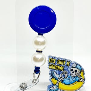 This shift is bananas topper with badge reel