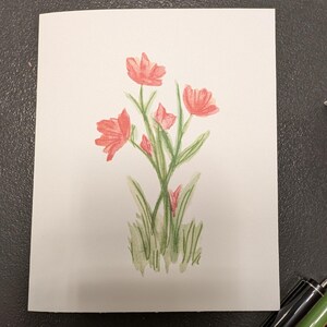 Red Tulips on front of greeting card