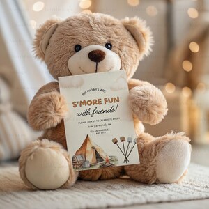 May include: A teddy bear holding a birthday invitation with a campfire and tent illustration. The invitation reads "Birthdays are S'more Fun with Friends!" and includes details for a party celebrating Avery.