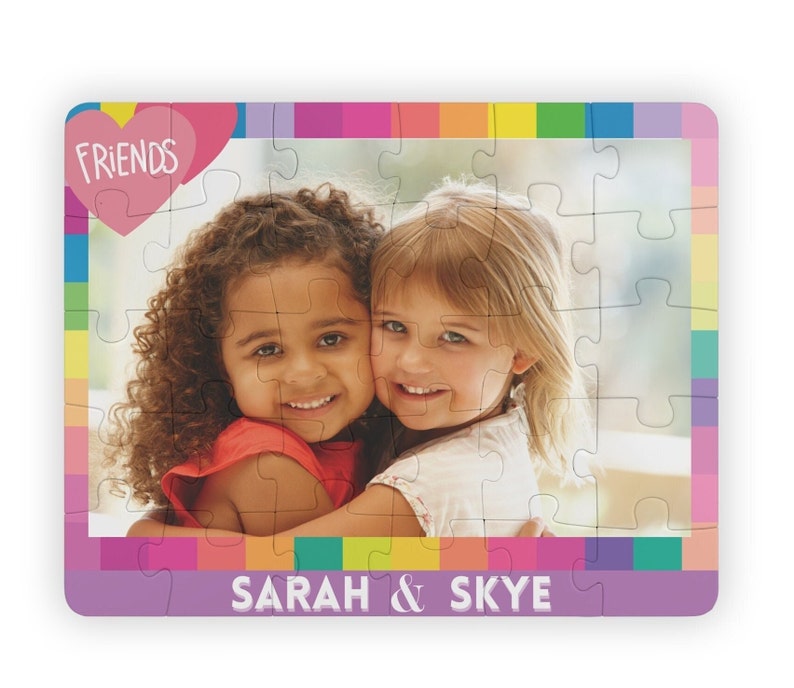 Colorful Custom photo puzzle with personalized name at  bottom. Girl Puzzle has a pink heart with  word friends in top left.