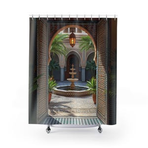 Moroccan inspired shower curtain with colorful ornate door opening into a courtyard with a fountain, lush greenery and a lantern.