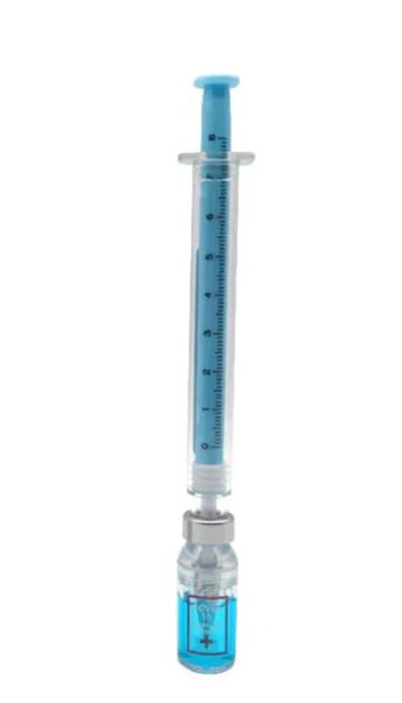 May include: A blue and clear syringe with a blue plunger and measurement markings, connected to a small glass vial containing blue liquid. The vial has a white label with a blue cross symbol.