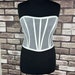 see more listings in the Corset section