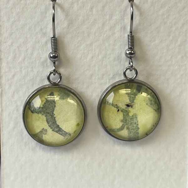 Jewelry pieces made from one-of-a-kind mixed-media collage art