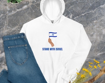 May include: White hooded sweatshirt with a blue and white Israeli flag and the text "STAND WITH ISRAEL" printed on the front.