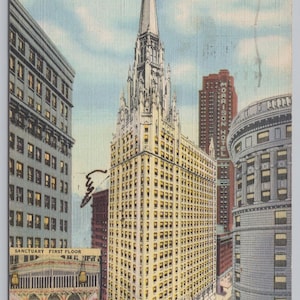 May include: Vintage postcard featuring The Chicago Temple, a tall, ornate building with a spire and cross, surrounded by other buildings. The text "The Chicago Temple, Clark at Washington, Chicago, Ill." is printed at the top.