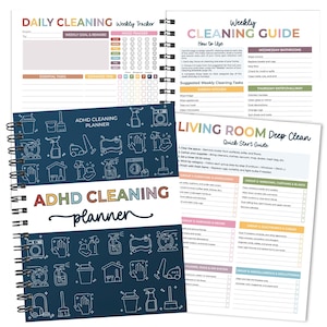 May include: A spiral-bound ADHD cleaning planner with a navy blue cover featuring cleaning icons. The planner includes a weekly tracker, cleaning guide, and a quick start guide for the living room. The text "ADHD Cleaning Planner" is displayed.