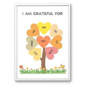 May include: A white framed printable with the text "I am grateful for" and a tree with heart-shaped leaves. Each leaf has a word written on it, such as "Mom", "Dad", "Hugs", "Toys", "School", "Friend", "Cat", and "Dog". The tree is surrounded by a green grass border with small yellow flowers.