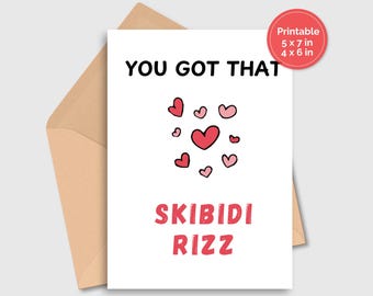 May include: A white card with the text "You got that" in black, followed by a cluster of red and pink hearts and the text "Skibidi Rizz" in red.
