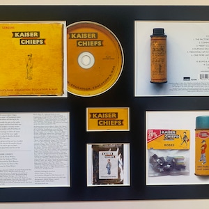 KAISER CHIEFS - Education, Education, Education & War - Présentoir pour albums de luxe