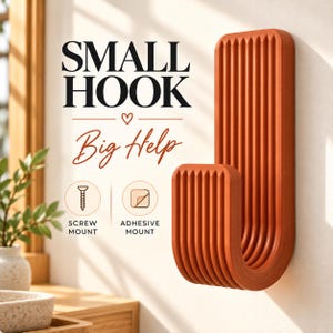 May include: A terracotta-colored wall hook with a vertical ribbed texture. The text reads SMALL HOOK Big Help. Icons indicate two mounting options: a screw mount and an adhesive mount. The hook is mounted on a light-colored wall surface.