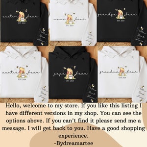 May include: Six different color variations of a hooded sweatshirt with a Winnie the Pooh inspired design. The sweatshirts feature a cartoon image of Winnie the Pooh holding a jar of honey with bees flying around him. The text on the sweatshirts reads "custom bear", "mama bear", "grandpa bear", "auntie bear", "papa bear", and "grandma bear". Each sweatshirt also includes the text "EST. 2024".