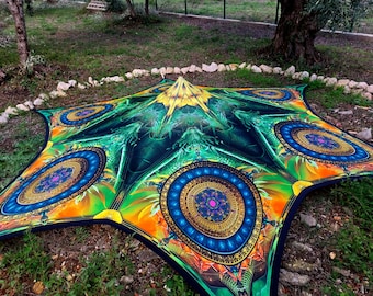 May include: A large, colorful, star-shaped canopy tent with a psychedelic design featuring green, blue, gold, and orange colors. The tent has a central point and multiple points around the edges, creating a star shape.