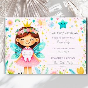 May include: A pink and blue tooth fairy certificate with a cartoon tooth fairy holding a tooth. The certificate reads "Tooth Fairy Certificate", "This is to certify that Drew Feig lost the tooth on the 06.04.2022", "Congratulations! The Tooth Fairy".