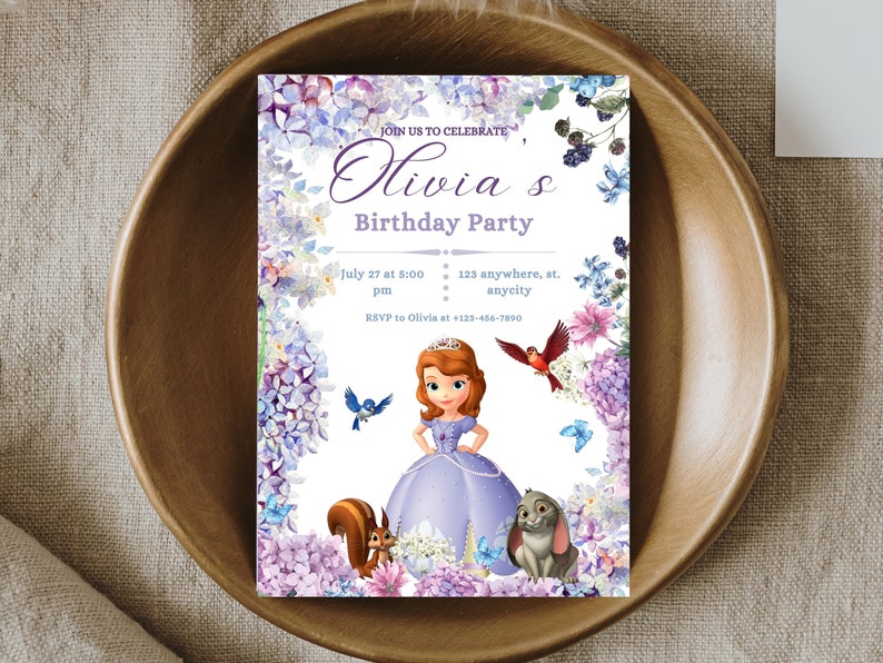May include: A purple and white birthday party invitation featuring a cartoon princess with a crown and a purple dress. The invitation has a floral border with purple, pink, and blue flowers. The text on the invitation reads "Join us to celebrate Olivia's Birthday Party" and includes the date, time, and location of the party.