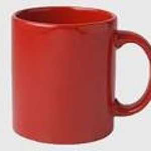 May include: A solid red ceramic mug with a rounded handle.