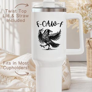 A stainless steel insulated tumbler featuring a detailed black raven illustration with wings spread, paired with the phrase "F-Caw-F" in playful script; the design blends gothic and humorous elements, creating a unique travel cup for bird enthusiasts, crow lovers, or fans of dark sarcastic quotes; shown on tumblers in various matte finishes, each with a handle and straw for practical everyday use.