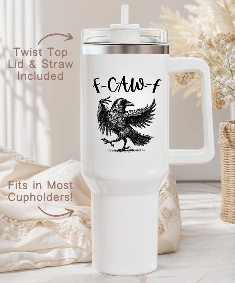 A stainless steel insulated tumbler featuring a detailed black raven illustration with wings spread, paired with the phrase "F-Caw-F" in playful script; the design blends gothic and humorous elements, creating a unique travel cup for bird enthusiasts, crow lovers, or fans of dark sarcastic quotes; shown on tumblers in various matte finishes, each with a handle and straw for practical everyday use.