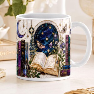 A white ceramic mug with a detailed illustration of a night sky, books, flowers, and butterflies.