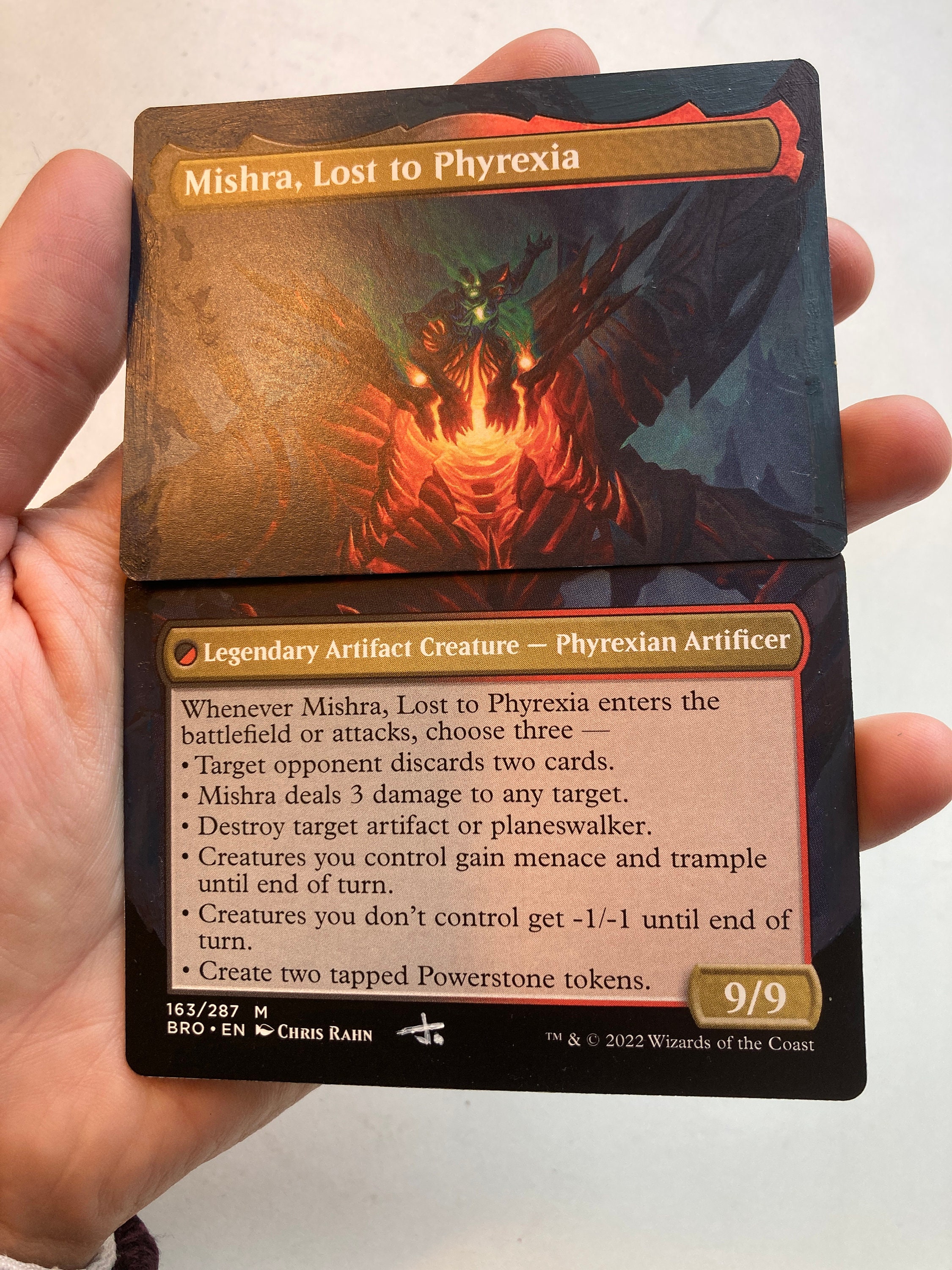 Painted Borderless Alter of Mishra, Claimed by Gix, and Phyrexian Dragon Engine, Which Meld Into