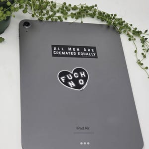 all men are cremated equally black and white rectangle vinyl sticker
