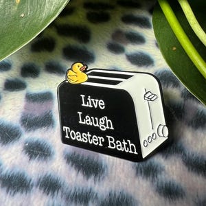 funny enamel pins: live laugh toaster bath pinback button
