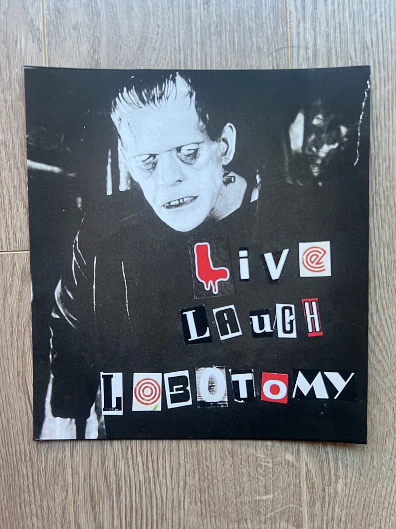 May include: Black and white image of a monster with the words "Live Laugh Lobotomy" in red and white letters.