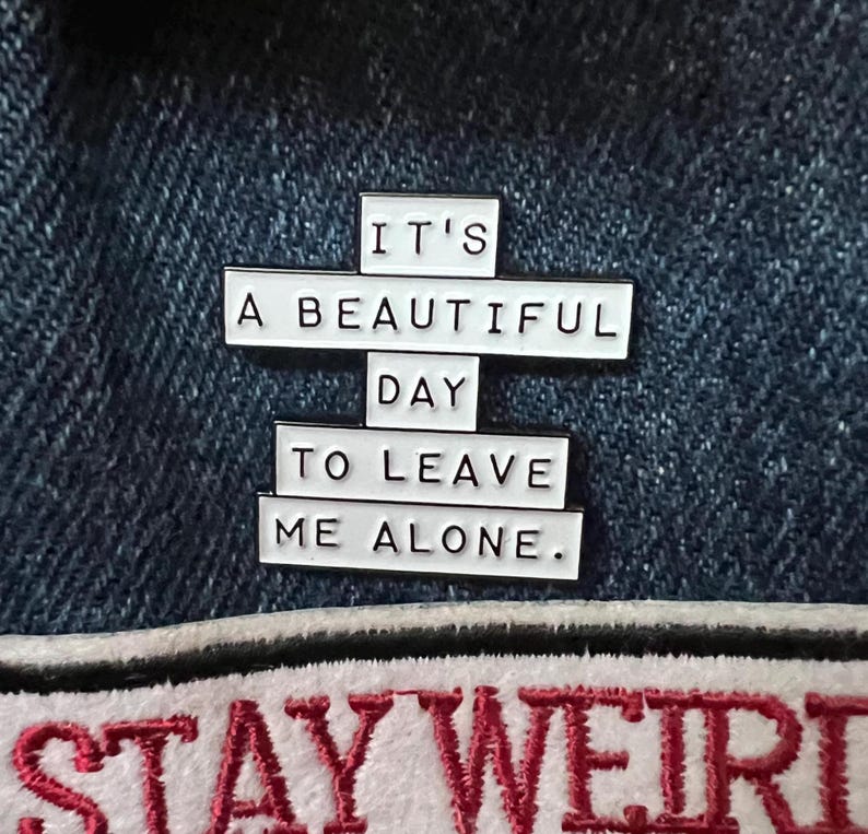 this is a perfect soft enamel pin for introverts and people who hate people. "it's a beautiful day to leave me alone." funny punk pins.