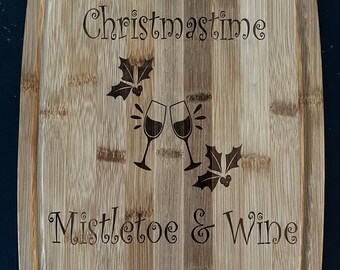 Christmastime Mistletoe & Wine theme cutting serving charcuterie meat