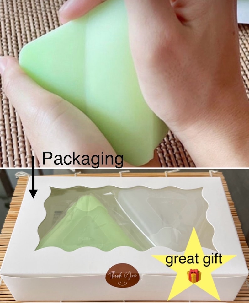 May include: A white box with a clear window showing two green silicone molds shaped like pyramids. The box has a "Thank You" sticker and a yellow star with the text "great gift".