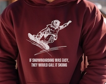 Puede incluir: Una sudadera con capucha color granate con un gráfico blanco de un snowboarder y el texto "Si el snowboard fuera fácil, lo llamarían esquí."