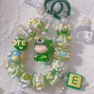 AMLLS Dinosaur Hand Painted Bead Keychain | Bag charm | phone charm | Handmade beads | Unique Beads | Popmart bean