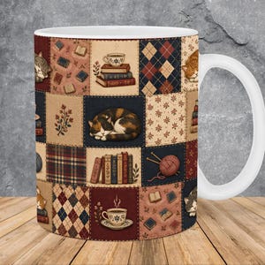 May include: A white ceramic mug featuring a patchwork quilt design with illustrations of sleeping cats, stacks of books, cups of coffee, yarn balls with knitting needles, and various patterns including plaid and argyle in shades of brown, blue, and red.