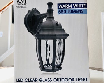 Maxxima Led Clear Glass Outdoor Light With Dusk To Dawn Sensor MEL-6150W Black