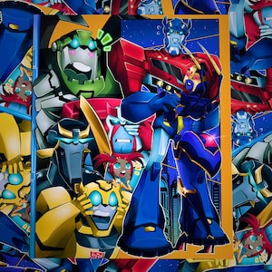 May include: A group of Transformers robots in a comic book style. The robots are in various poses and colors, including red, blue, yellow, and green. The background is a dark blue with stars.