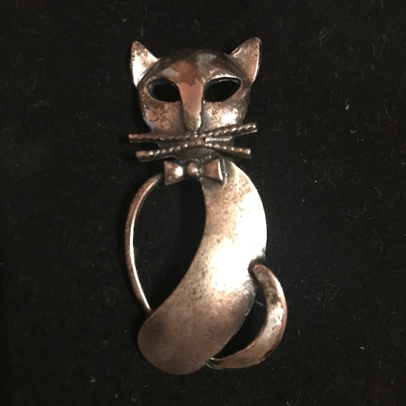 Abstract Cat brooch with bow tie