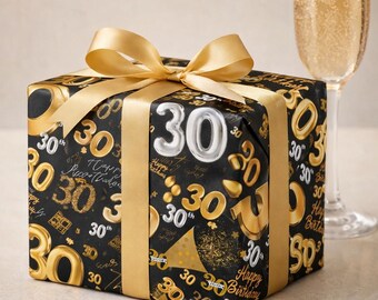 May include: A wrapped gift box with a gold ribbon and bow. The black wrapping paper is decorated with gold and silver "30" numerals and the words "Happy Birthday". A glass of champagne is in the background.