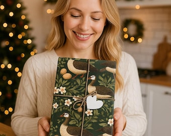Elegant kerstcadeaupapier met de afbeelding van zes ganzen die eieren leggen, cadeaupapier met de tekst '12 dagen van Kerstmis', luxe cadeaupapier voor Kerstmis.