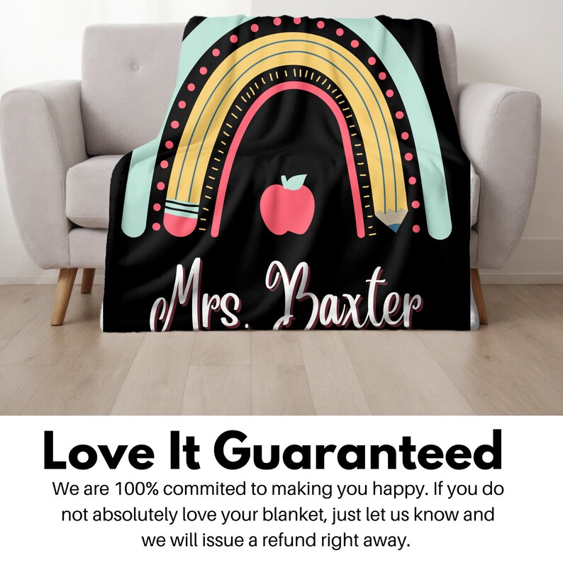 May include: Black and white teacher blanket with a rainbow, pencils, and an apple. The text "Mrs. Baxter" is printed on the blanket.