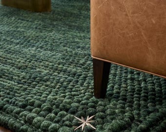 Parveen Yarn Traders - Hand Woven Chunky Wool  Area Rugs dark green chunky wool area rug for modern living rooms and cozy bedroom decor.