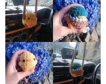 Retro swinging crochet decoration. chick and duck