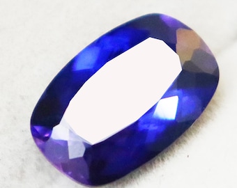 Edelstein Tansanit, Kissenschliff 9.90 ct, 15 x 10 mm