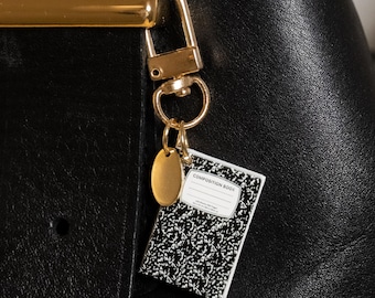 Mini portachiavi con ciondolo a forma di borsa per libri