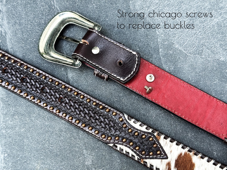 May include: A brown leather belt with a silver buckle and a braided design. The belt has a red lining and two silver screws. The text "Strong chicago screws to replace buckles" is visible in the image.