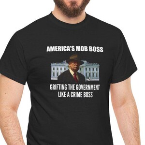 Le patron de la foule de Donald Trump America T-shirt graphique unisexe