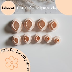 May include: A collection of ten beige polymer clay cutters in different sizes and shapes. The cutters are arranged in two rows, featuring a flower-like design. The image includes the text "labecut Cutter for polymer clay" and "STL file for 3D printer."
