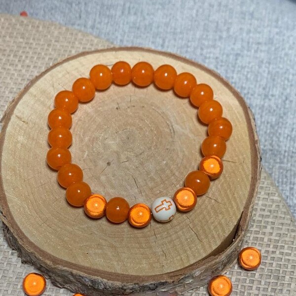 bracelet orange et croix