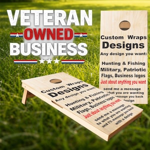May include: A wooden cornhole board and a vertical board with the text "Custom Wraps Designs" and "Veteran Owned Business". The boards have a natural wood finish and feature text about design options, including hunting, fishing, and business logos.